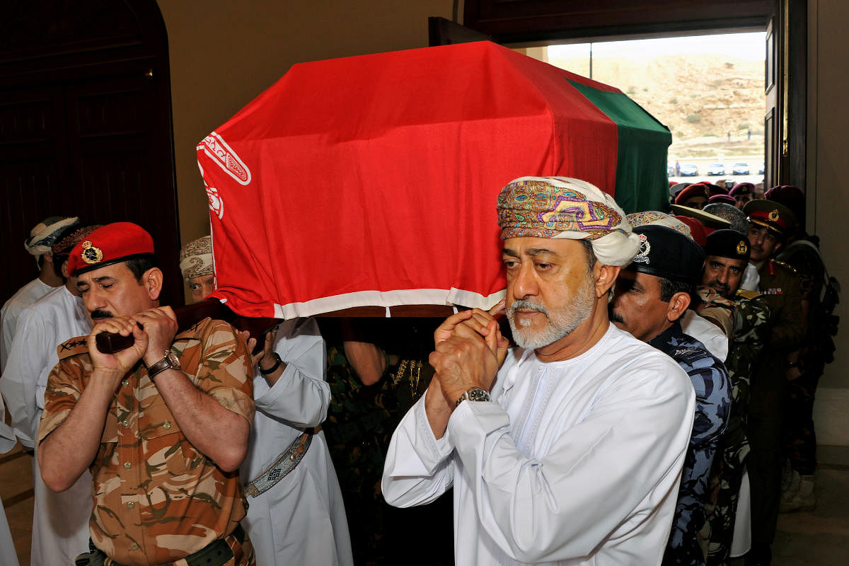Oman's newly sworn-in Sultan Haitham bin Tariq al-Said carries the coffin of his cousin, the late Sultan Qaboos, during the funeral in Muscat, Oman. (REUTERS Photo)
