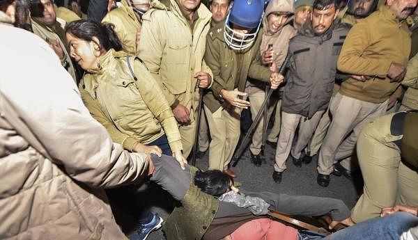 Police detain Jawaharlal Nehru University (JNU) students who were protesting outside the Shastri Bhawan against January 5 violence on the university campus, in New Delhi, Thursday, Jan. 9, 2020. (PTI Photo/Ravi Choudhary)