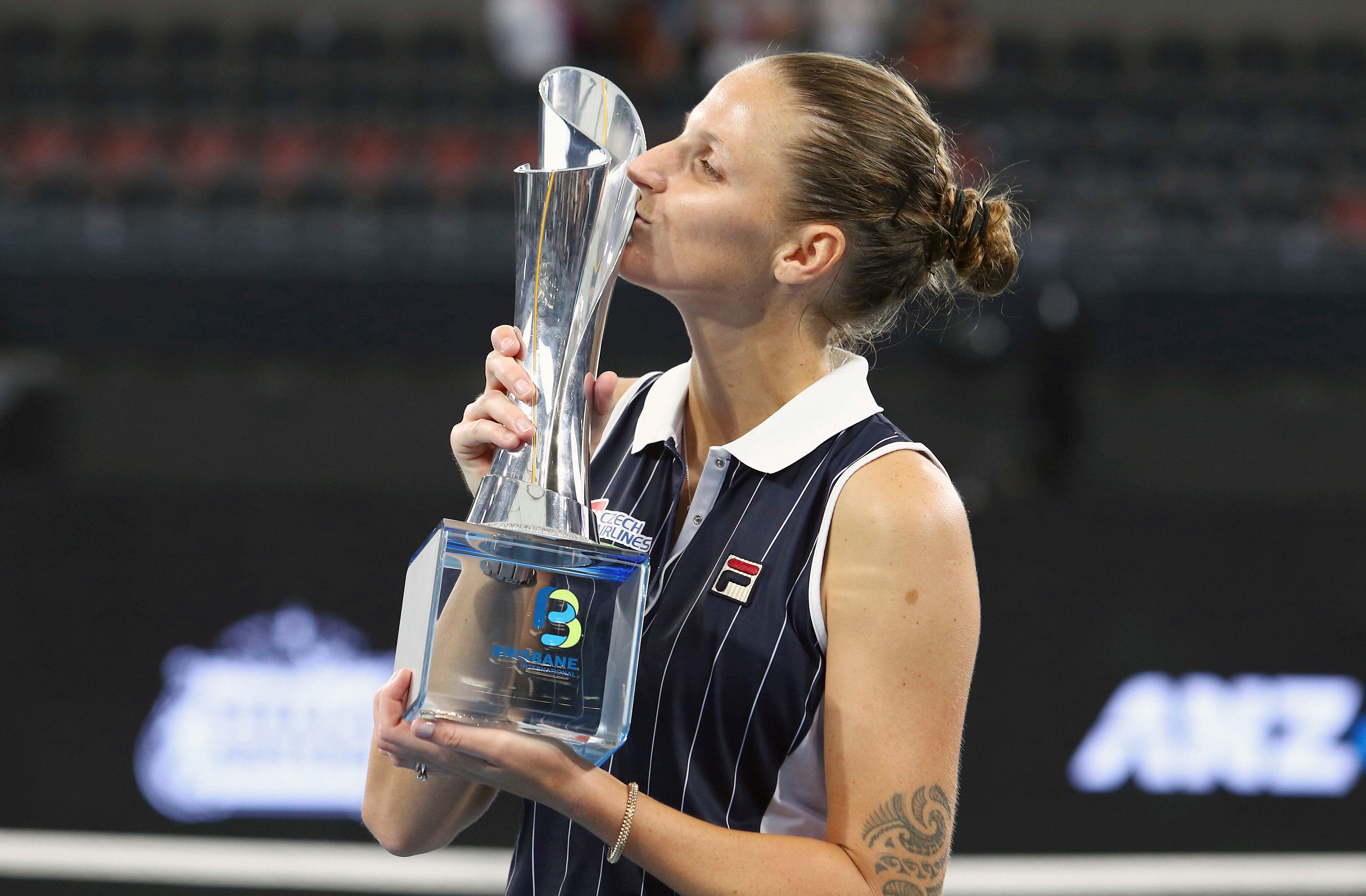 Karolina Pliskova of the Czech Republic poses with the trophy after she won her final match against Madison Keys of the United States 6-4, 4-6, 7-5, at the Brisbane International tennis tournament in Brisbane, Australia. (AP Photo)