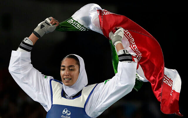 Kimia Alizadeh of Iran celebrates after winning the bronze medal in a women's Taekwondo 57-kg competition at the 2016 Summer Olympics in Rio de Janeiro, Brazil, Thursday, Aug. 18, 2016. (AP File Photo)