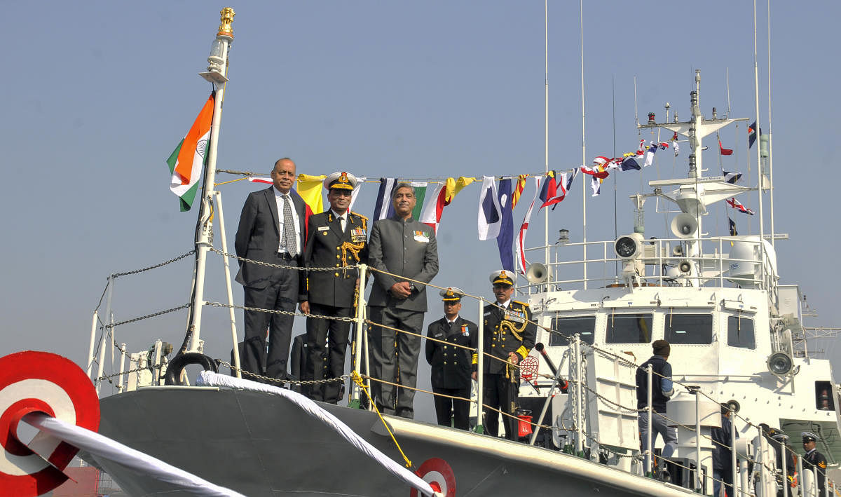 Defence Secretary Ajay Kumar(L), Director General of Indian Coast Guard Krishnaswami Natarajan (C) and Garden Reach Shipbuilders & Engineers (GRSE) Chairman and Managing Director Rear Admiral V K Saxena(Retd.) poses during a commissioning ceremony of ICGS (Indian Coast Guard Ship) 'Annie Besant' and 'Amrit Kaur', at Khidderpore Dock, in Kolkata. PTI