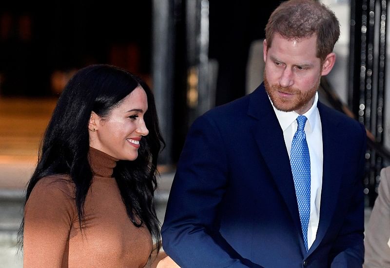 Britain's Prince Harry and his wife, Meghan. (AFP Photo)