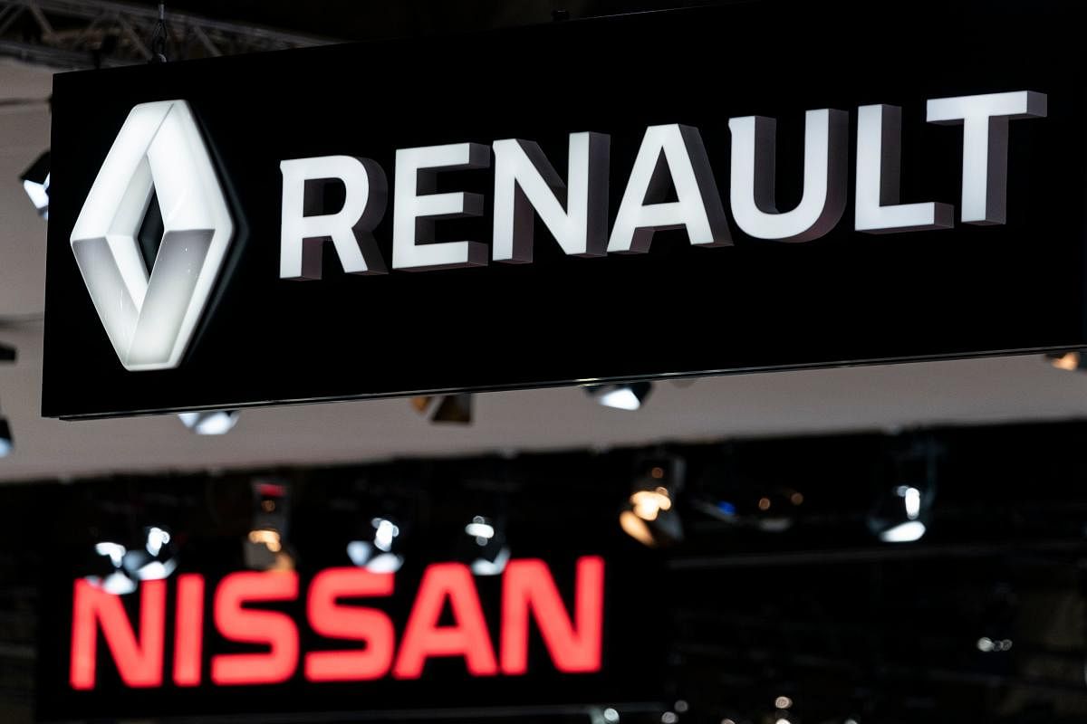 Renault and Nissan autocar logos are pictured during the Brussel Motor Show (AFP PHOTO)