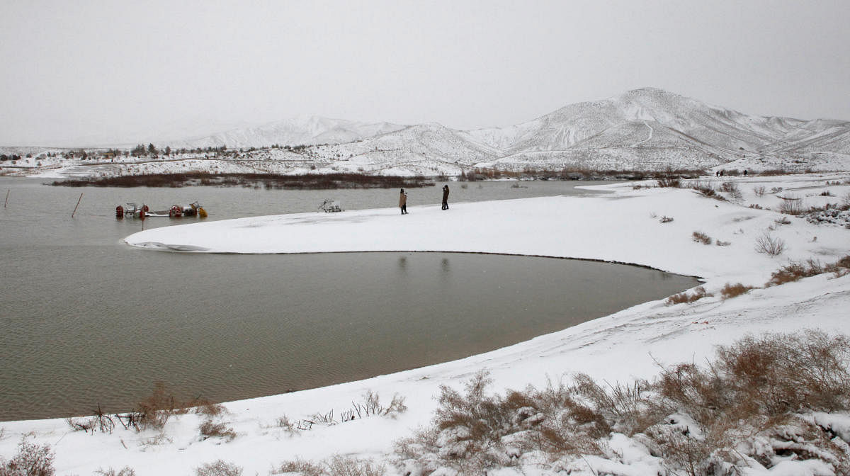 The snow-covered Hanna Lake after a snowfall on the outskirts of Quetta, Pakistan. (Reuters Photo)