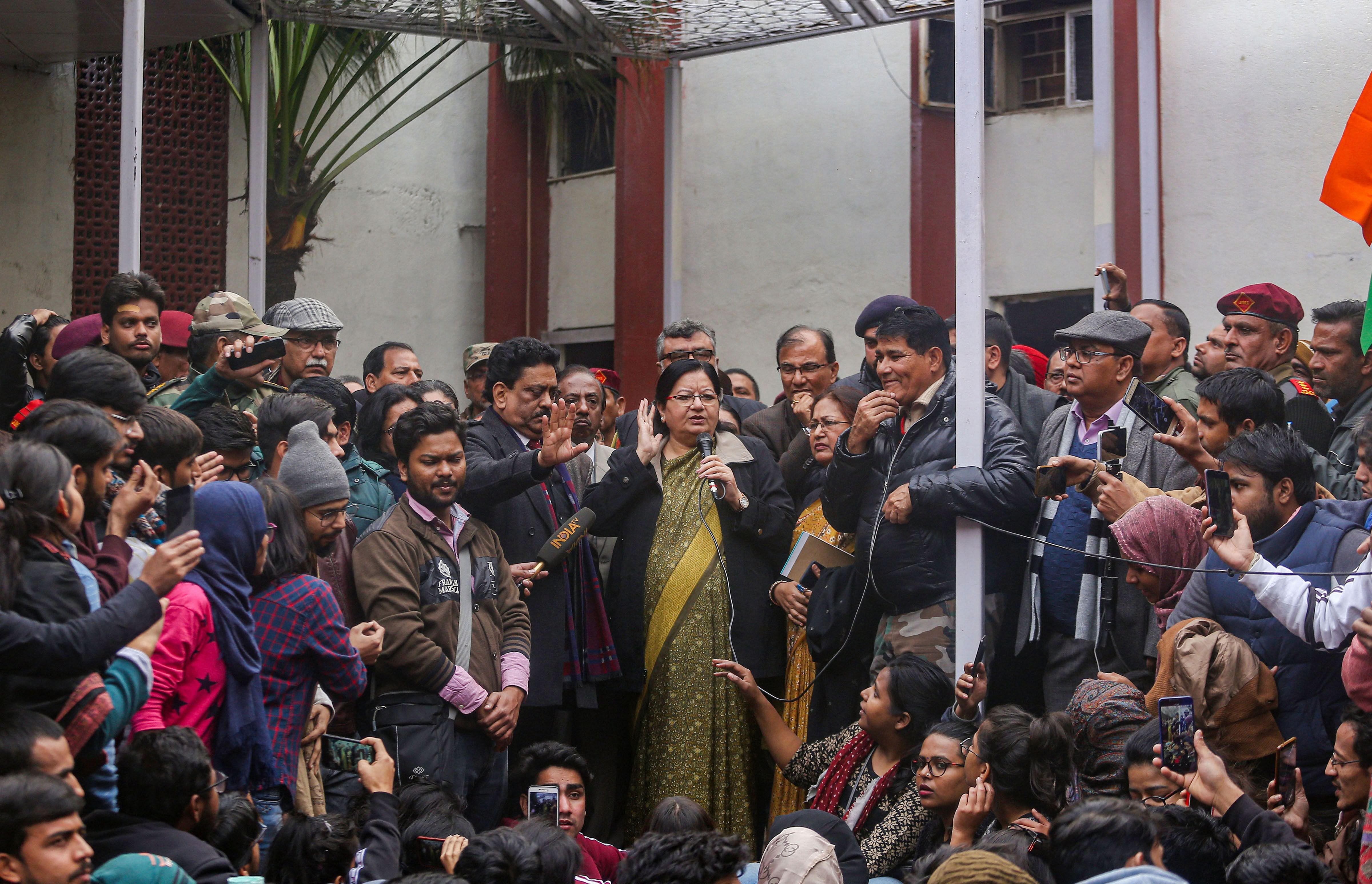 Jamia Millia Islamia VC Najma Akhtar addresses protesting students who were demanding registration of a FIR against the "police brutality" on campus last month, at Jamia campus in New Delhi, Monday, Jan. 13, 2020. (PTI Photo)