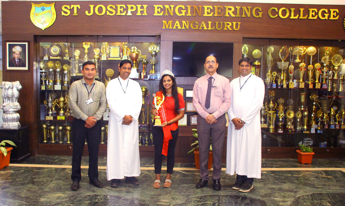 Student Christina George with the faculty of St Joseph Engineering College in Mangaluru.