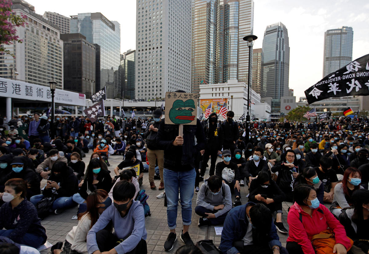 Anti-government protesters demonstrate during a protest at Edinburgh Place in Hong Kong, China. (Reuters Photo)