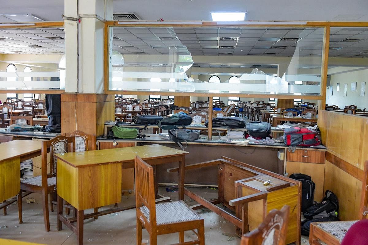Jamia Millia Islamia University library vandalised on Sunday night during a clash between police and students, in New Delhi, Wednesday, Dec. 18, 2019. Jamia Teachers Association and students have been agitating against the Citizenship Amendment Act (CAA). Credit: PTI