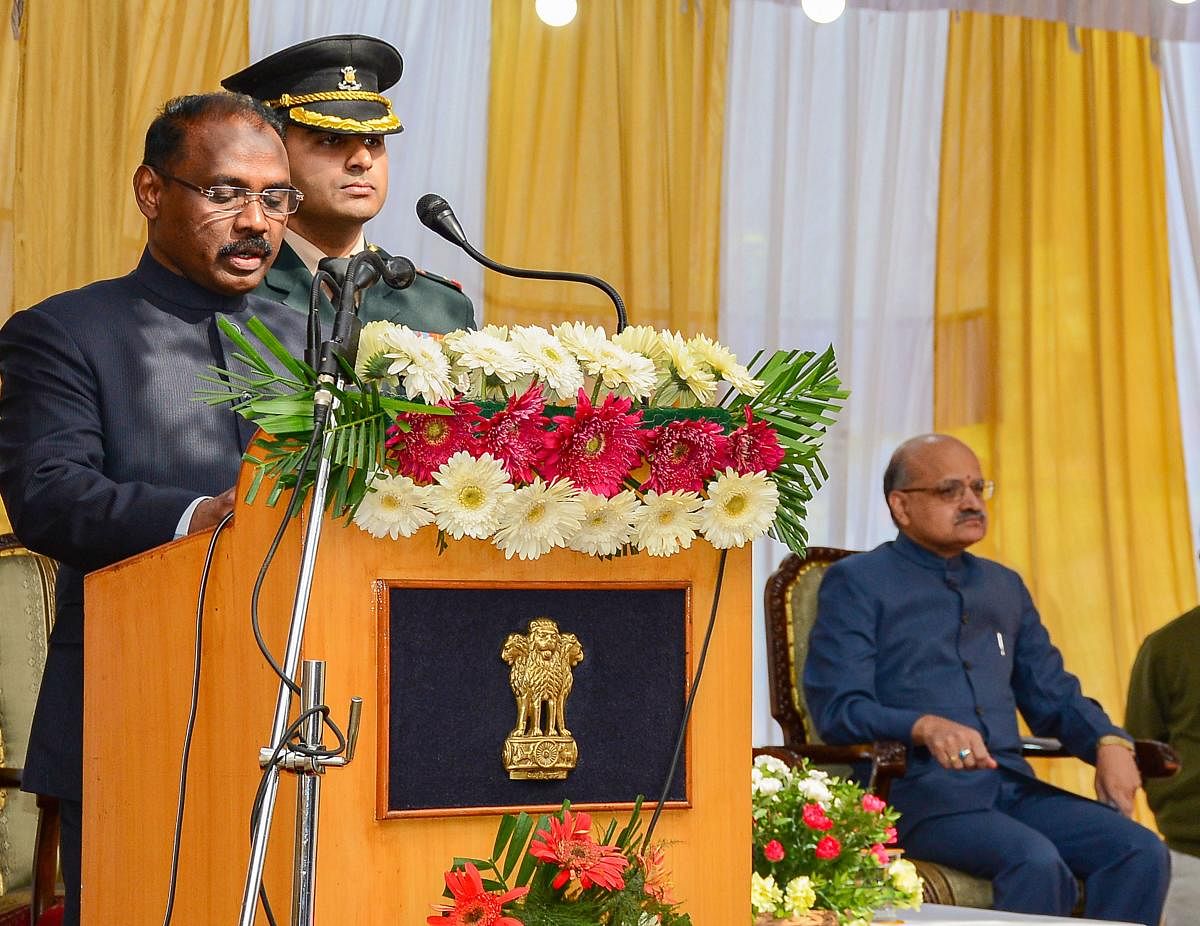 Girish Chandra Murmu being sworn-in as the 1st Lt. Governor of Jammu and Kashmir by Justice Gita Mittal (unseen), Chief Justice of Jammu and Kashmir High Court, at a ceremony in Srinagar, Thursday, Oct. 31, 2019. (PTI Photo)