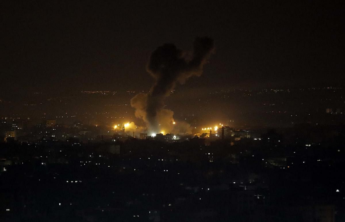 An explosion caused by Israeli airstrikes is seen on Gaza City (PTI Photo)