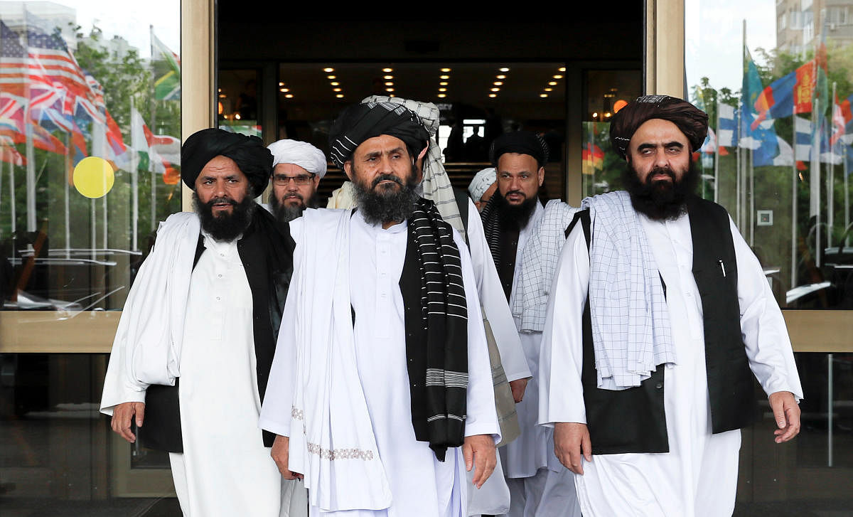 members of a Taliban delegation leaving after peace talks with Afghan senior politicians in Moscow, Russia. (REUTERS photo)