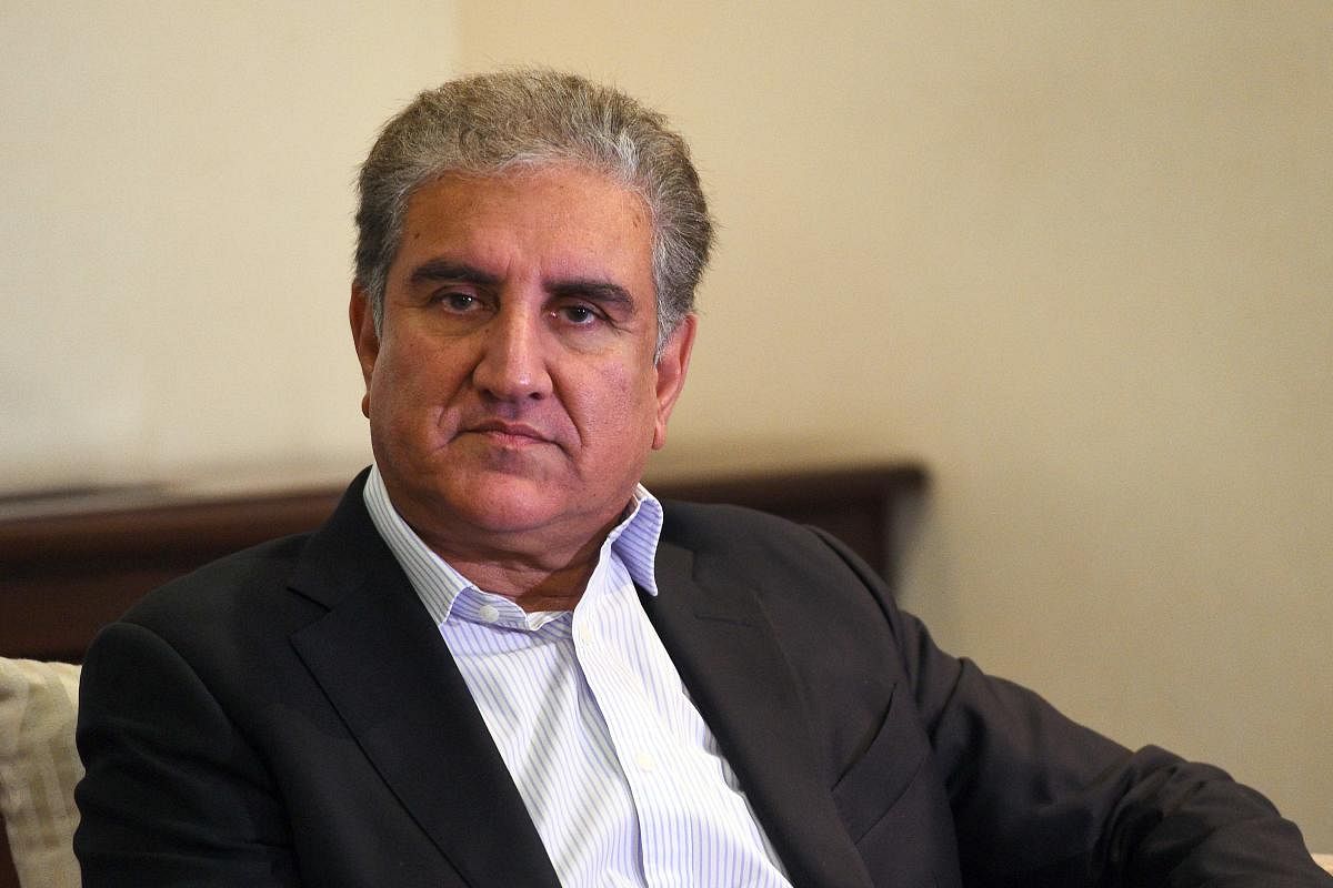 Pakistan's Foreign Minister Shah Mahmood Qureshi looks on after his arrival at Bandaranaike International Airport in Katunayake on the outskirts of Colombo. (AFP photo)