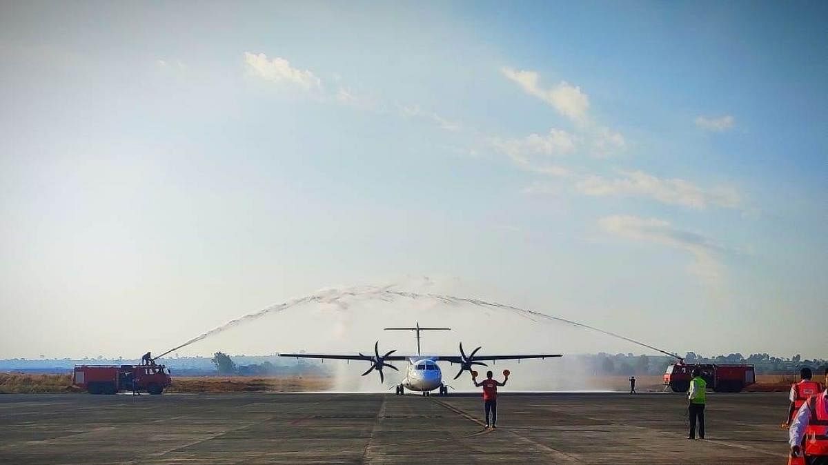 Water canon salute being given to the Trujet flight on its arrival at the airport in Belagavi on Friday.