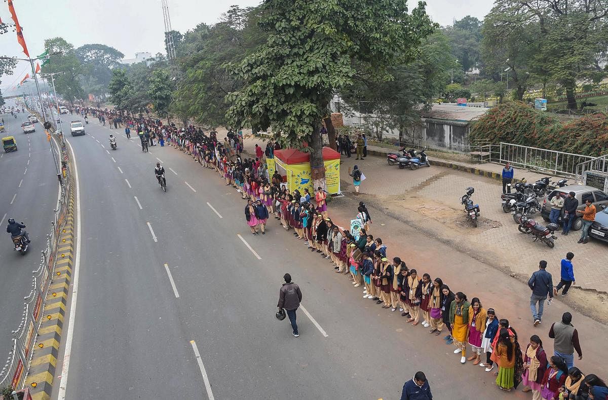 Students make a long human chain (PTI Photo)