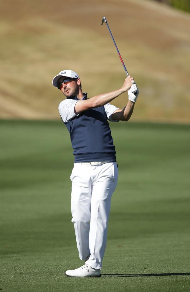Andrew Landry plays his second shot on the first hole during the third round of The American Express tournament at the Jack Nicklaus Tournament Course at PGA West on January 18, 2020 in La Quinta, California. (AFP Photo)