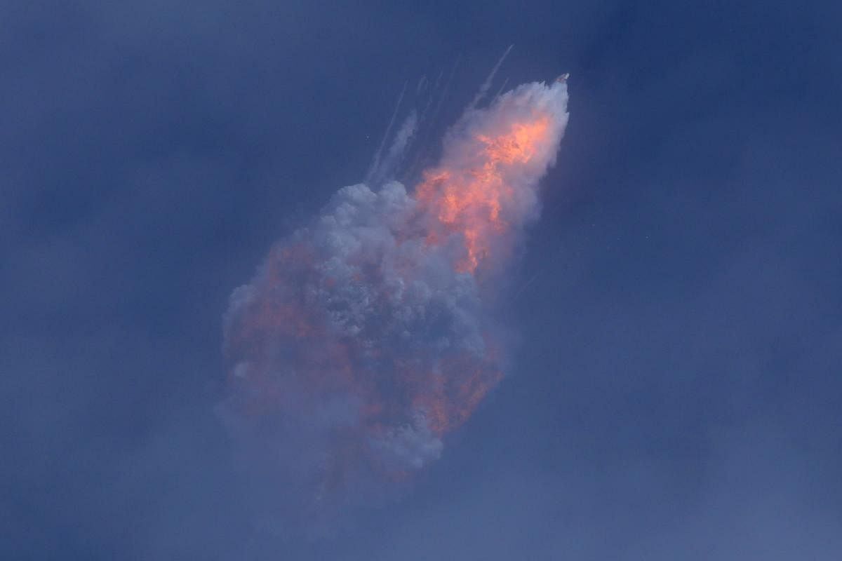 A SpaceX Falcon 9 rocket engine self-destructs after jettisoning the Crew Dragon astronaut capsule during an in-flight abort test after lift of from the Kennedy Space Center in Cape Canaveral. (Reuters Photo)