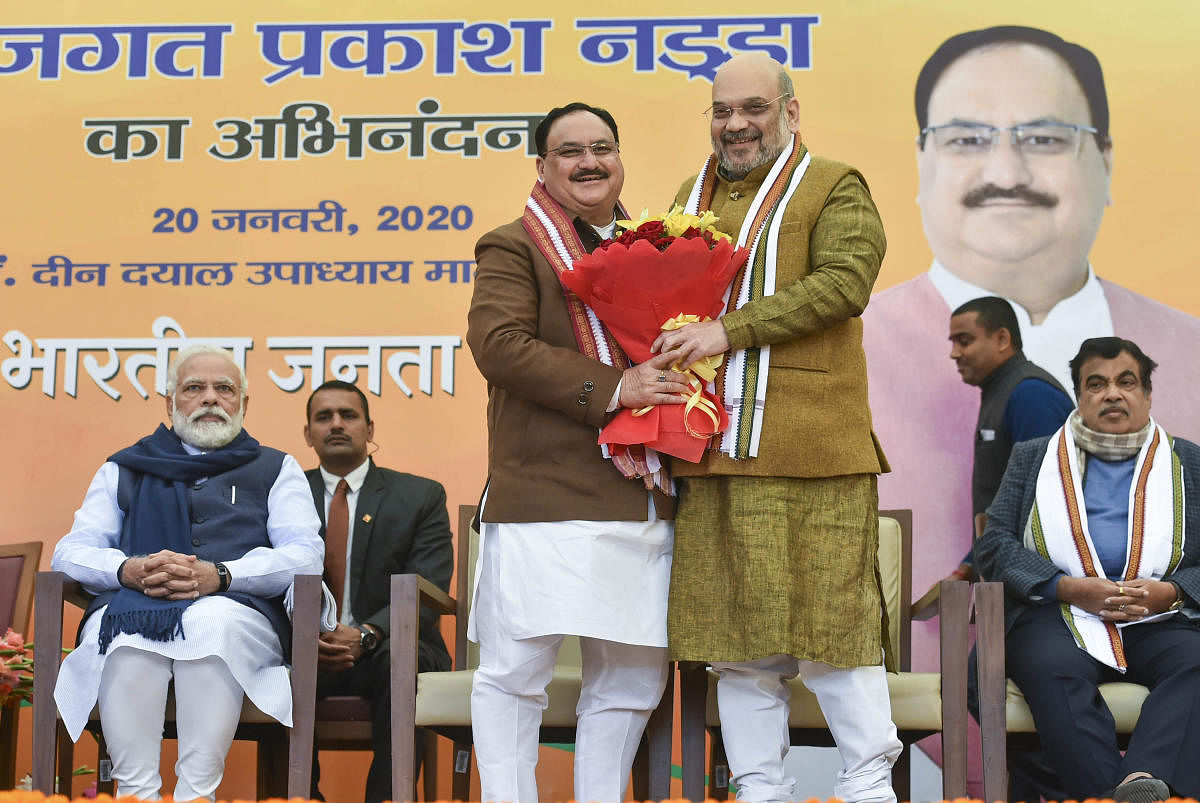 Union Home Minister Amit Shah greets newly elected BJP National President JP Nadda (PTI Photo)