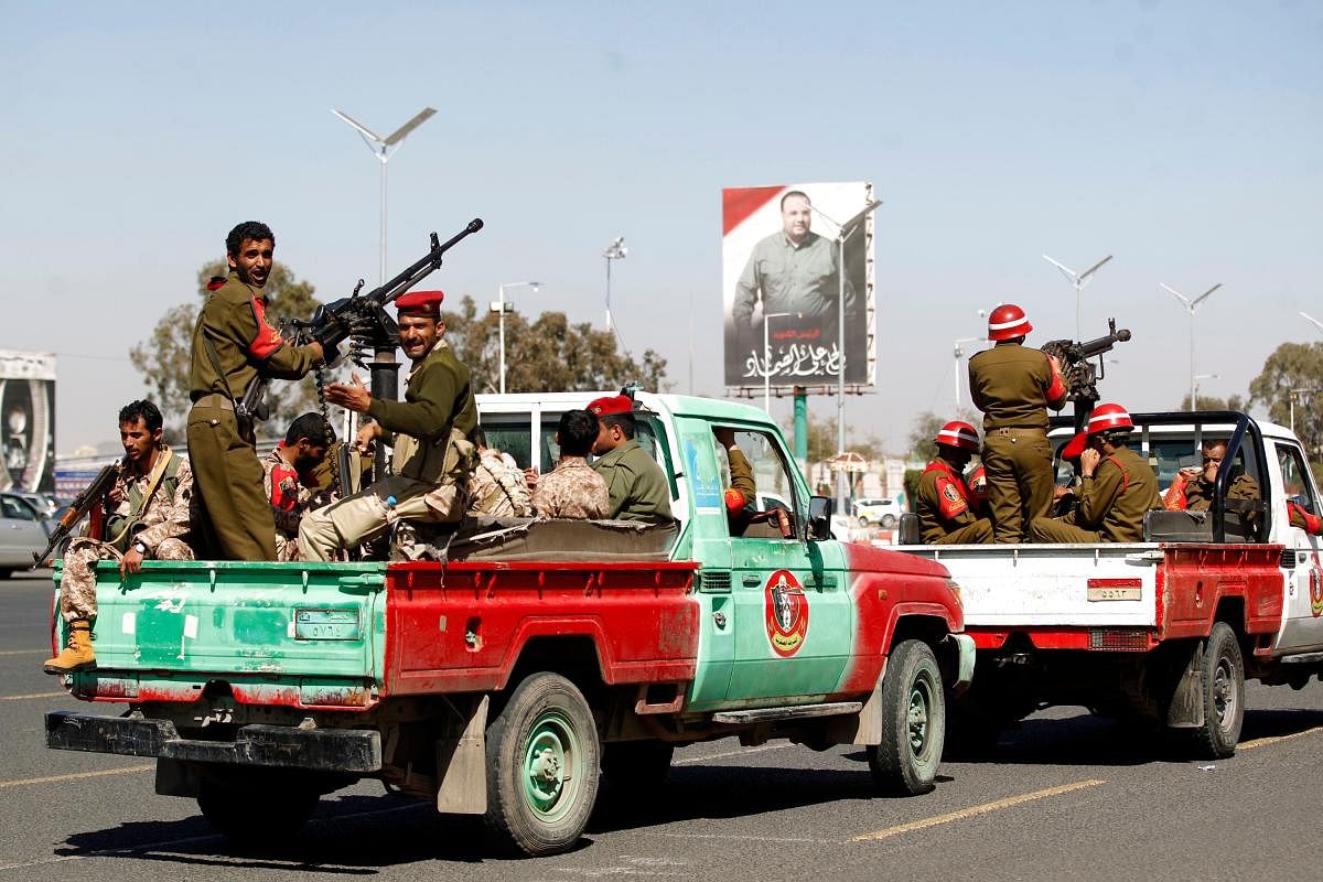 Members of the Yemeni Iran-backed Huthi rebels military police parade in the streets of the capital Sanaa (AFP Photo)