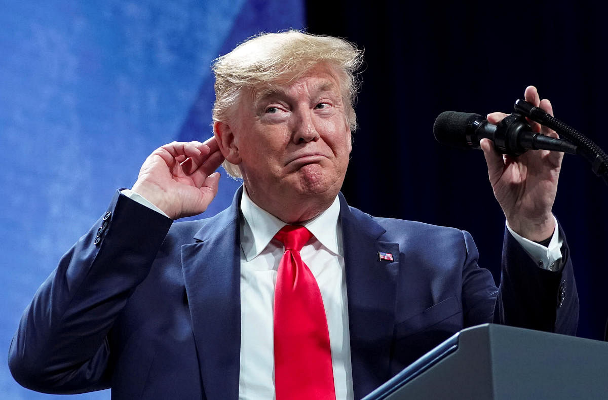 U.S. President Donald Trump puts his hand to his head while speaking at the American Farm Bureau Federation Annual Convention and Trade Show in Austin, Texas, January 19, 2020. (Reuters Photo)