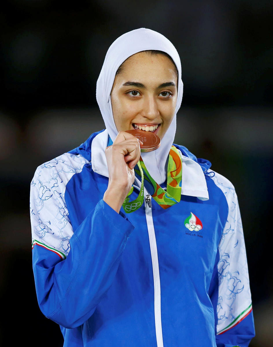 Kimia Alizadeh Zenoorin (IRI) of Iran celebrates with her bronze medal. (Reuters Photo)