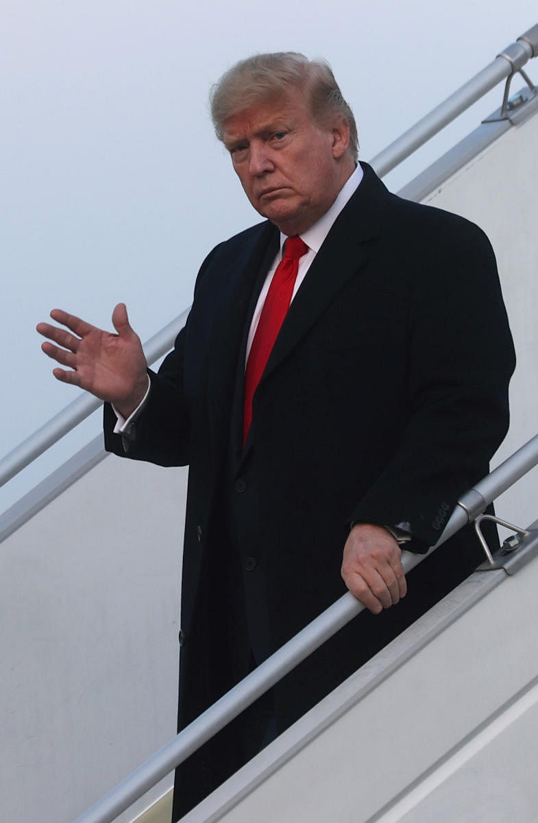  Donald Trump arrives aboard Air Force One en route to the Word Economic Forum in Davos, at Zurich International Airport. Reuters