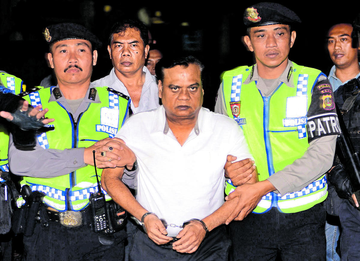 Chhota Rajan being escorted by Indonesian police. (AFP photo)