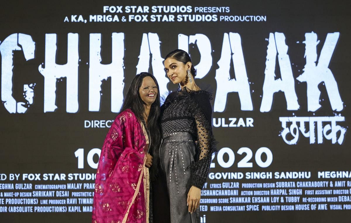  Bollywood actress and producer Deepika Padukone with acid-attack survivor Laxmi Agarwal during the launch of title track of film ‘Chhapaak’ (PTI Photo)