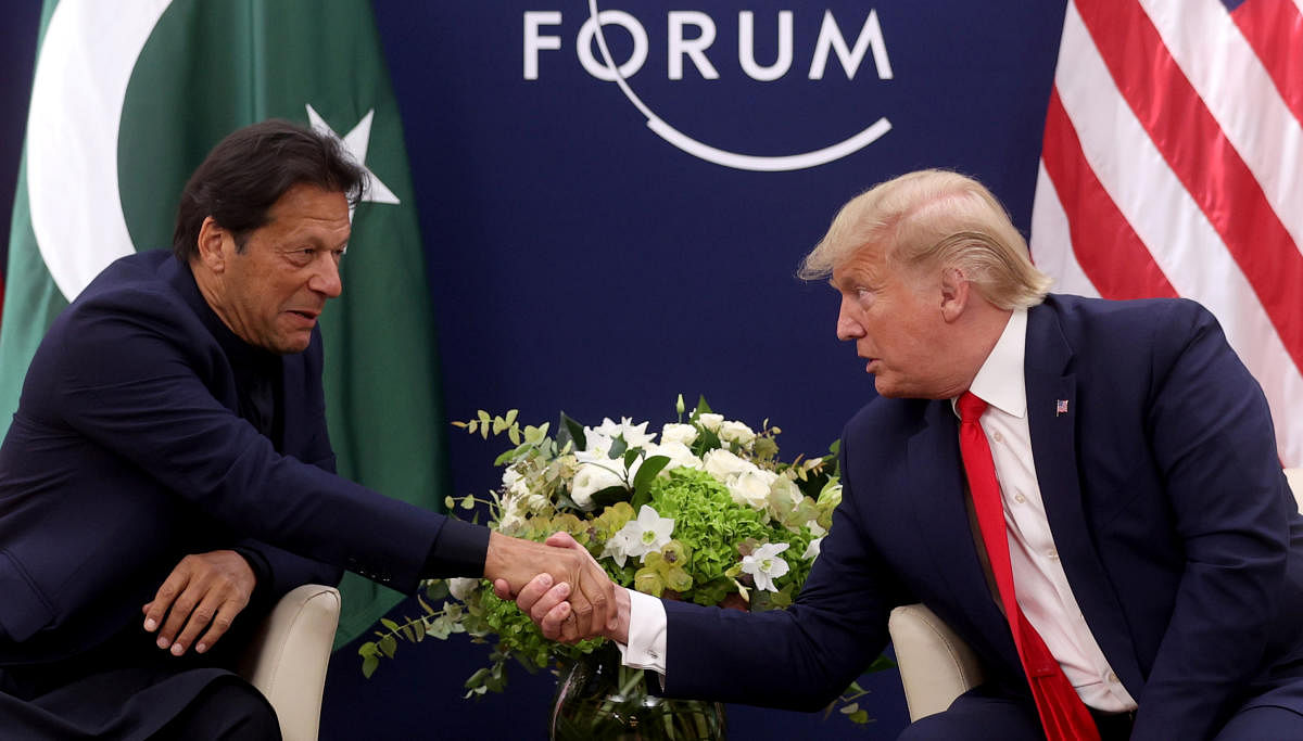 U.S. President Donald Trump shakes hands with Pakistan's Prime Minister Imran Khan during a bilateral meeting at the 50th World Economic Forum (WEF) annual meeting in Davos, Switzerland. (Photo by Reuters)
