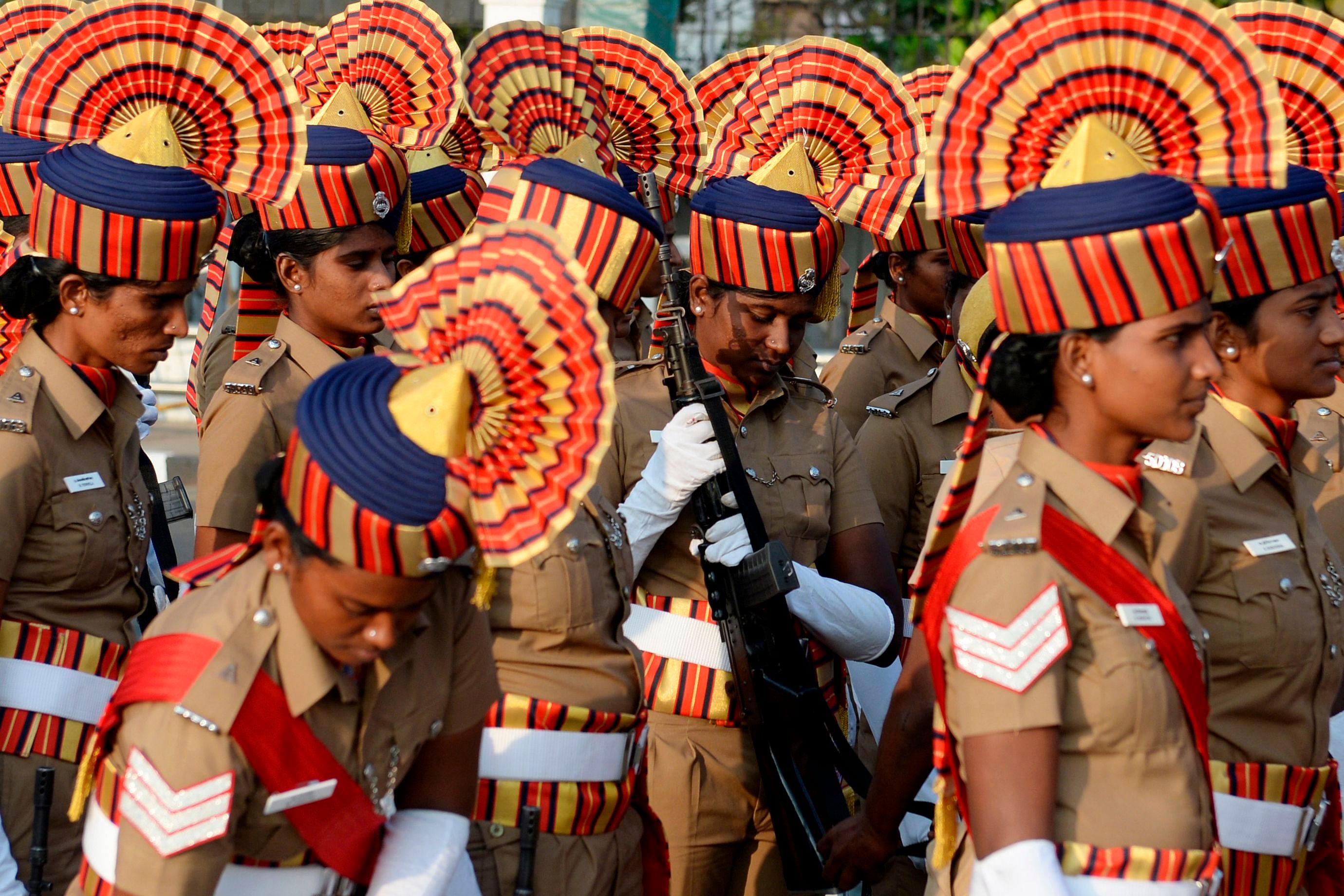 Women cadets of Tamilnadu Police Battalion prepare for a full dress rehearsal for the upcoming Indian Republic Day parade. (AFP Photo)