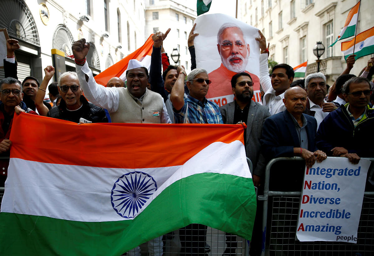 Demonstrators protest the scrapping of the special constitutional status in Kashmir by the Indian government, outside the Indian High Commission in London. (Reuters Photo)