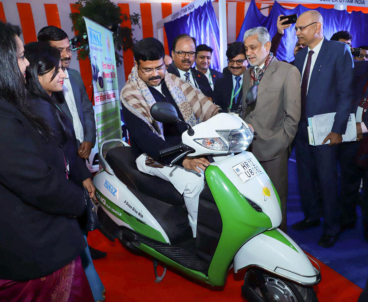 nion Minister for Petroleum & Natural Gas and Steel Dharmendra Pradhan (C) visits an exhibition, at the ‘National Conclave on Emerging Opportunities in Natural Gas Sector’, organised by Ministry of Petroleum & Natural Gas. PTI/PIB