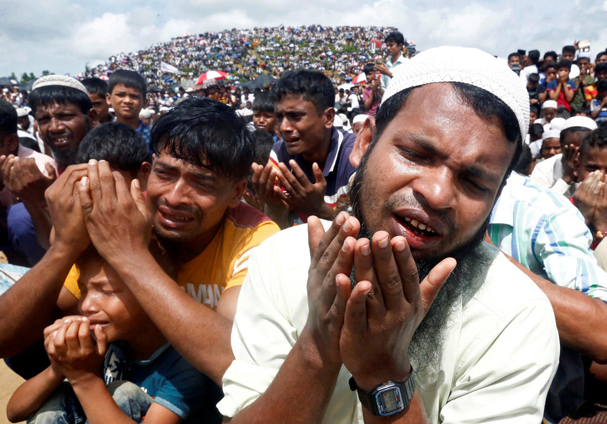 Rohingya refugees take part in a prayer as they gather to mark the second anniversary of the exodus at the Kutupalong camp in Cox’s Bazar, Bangladesh, August 25, 2019. (Reuters Photo)