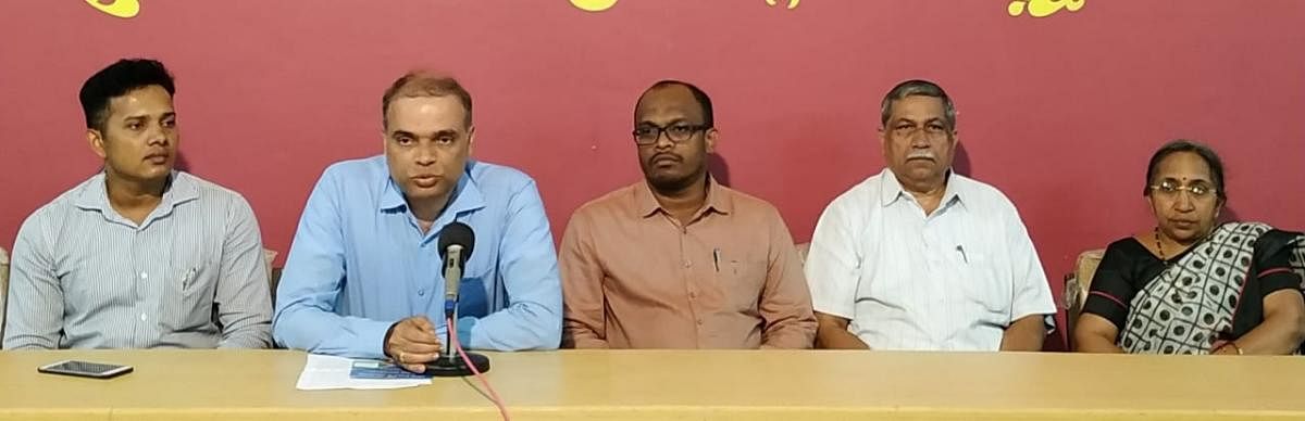 SIRC Udupi President Narasimha Nayak addresses mediapersons at the Press Club in Udupi on Thursday.