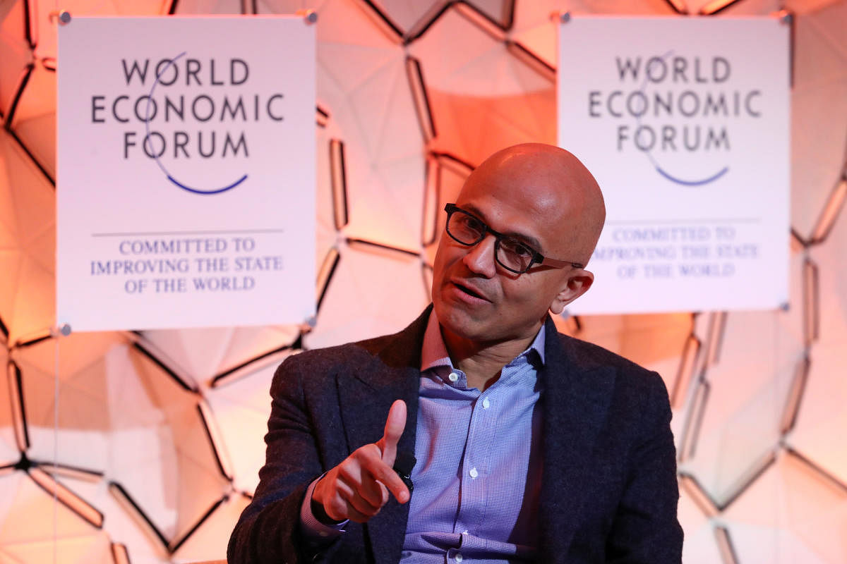 Satya Nadella, Chief Executive Officer of Microsoft, gestures as he attends a session at the 50th World Economic Forum (WEF) annual meeting in Davos, Switzerland. Reuters