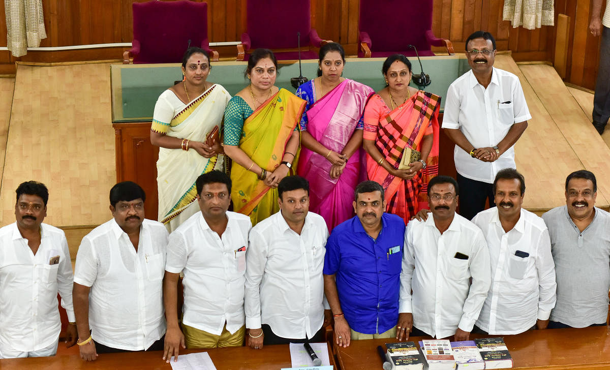 Mayor Goutham Kumar and his deputy C R Ram Mohan Raju with the new chairpersons of the BBMP standing committees. DH photo/Irshad Mahammad