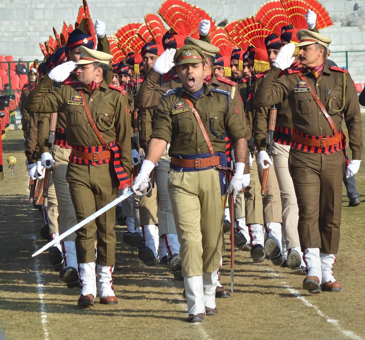 Police contingent marches during the full dress rehearsals for upcoming Republic day parade at Maulana Azad Stadium in Jammu. (PTI Photo)