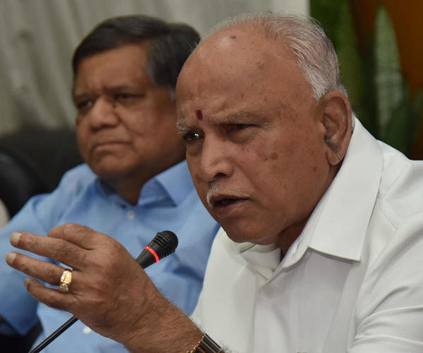 Chief Minister BS Yediyurappa and Large and Medium Scale Industries Minister Jagadish Shettar during the press conference at CM home office ‘Krishna’ in Bengaluru on Saturday, January 25, 2020. (DH Photo)