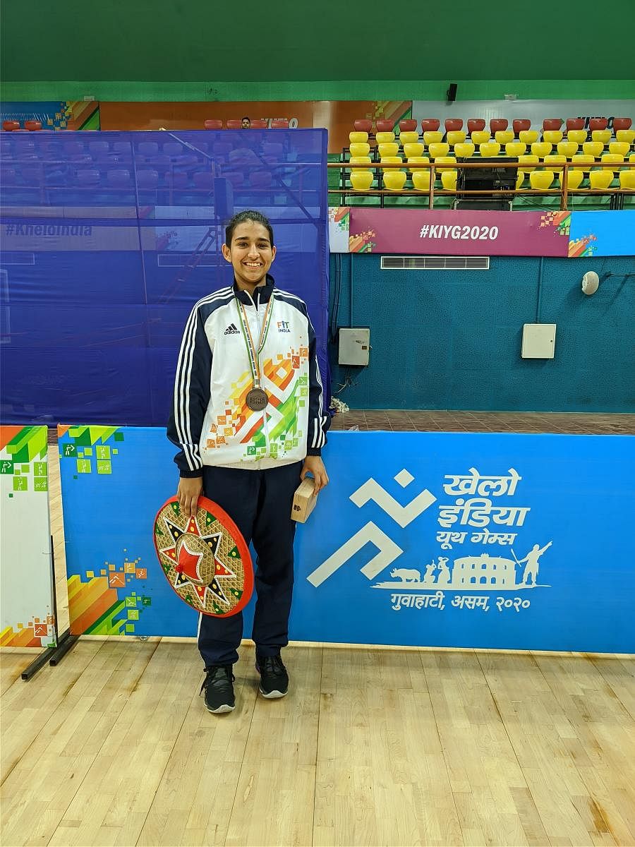 Pavani Sangwan with the bronze medal in the Khelo India Games in Guwahati.