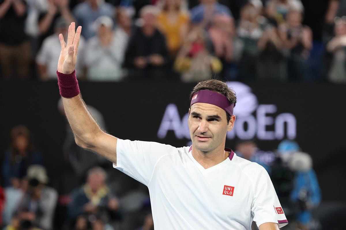 Roger Federer celebrates after victory against Hungary's Marton Fucsovics. (AFP Photo)