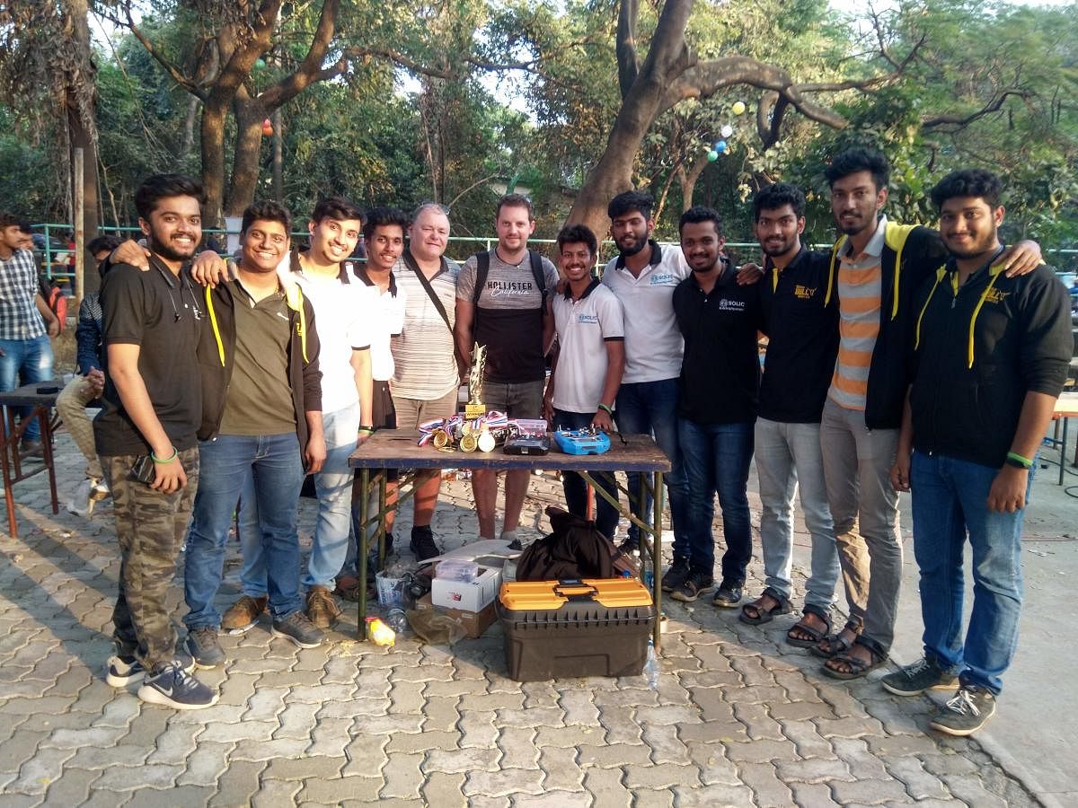 St Joseph Engineering College team with the championship trophy they won at Robot Combat Competition at IIT, Mumbai.