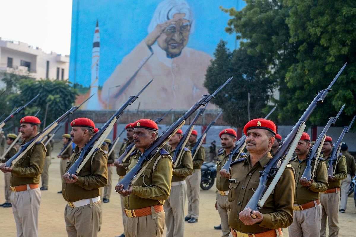 In this photo taken on January 22, 2020, Uttar Pradesh police personnel take part in a rehearsal for the upcoming India's Republic Day parade holding Lee-Enfield .303 rifles, which are decommissioned on Republic Day on January 26 following an order from U