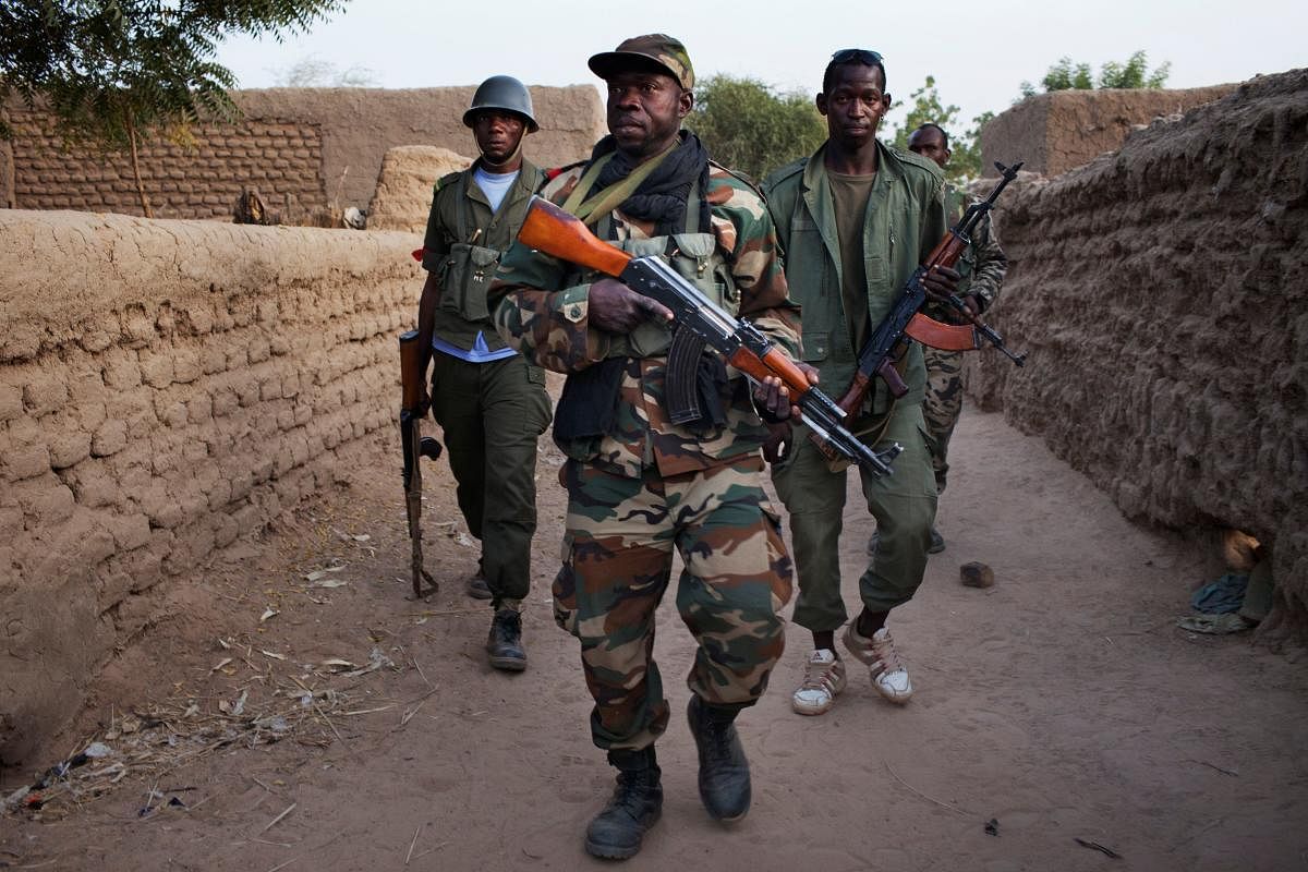 Malian soldiers patrol (Reuters File Photo)