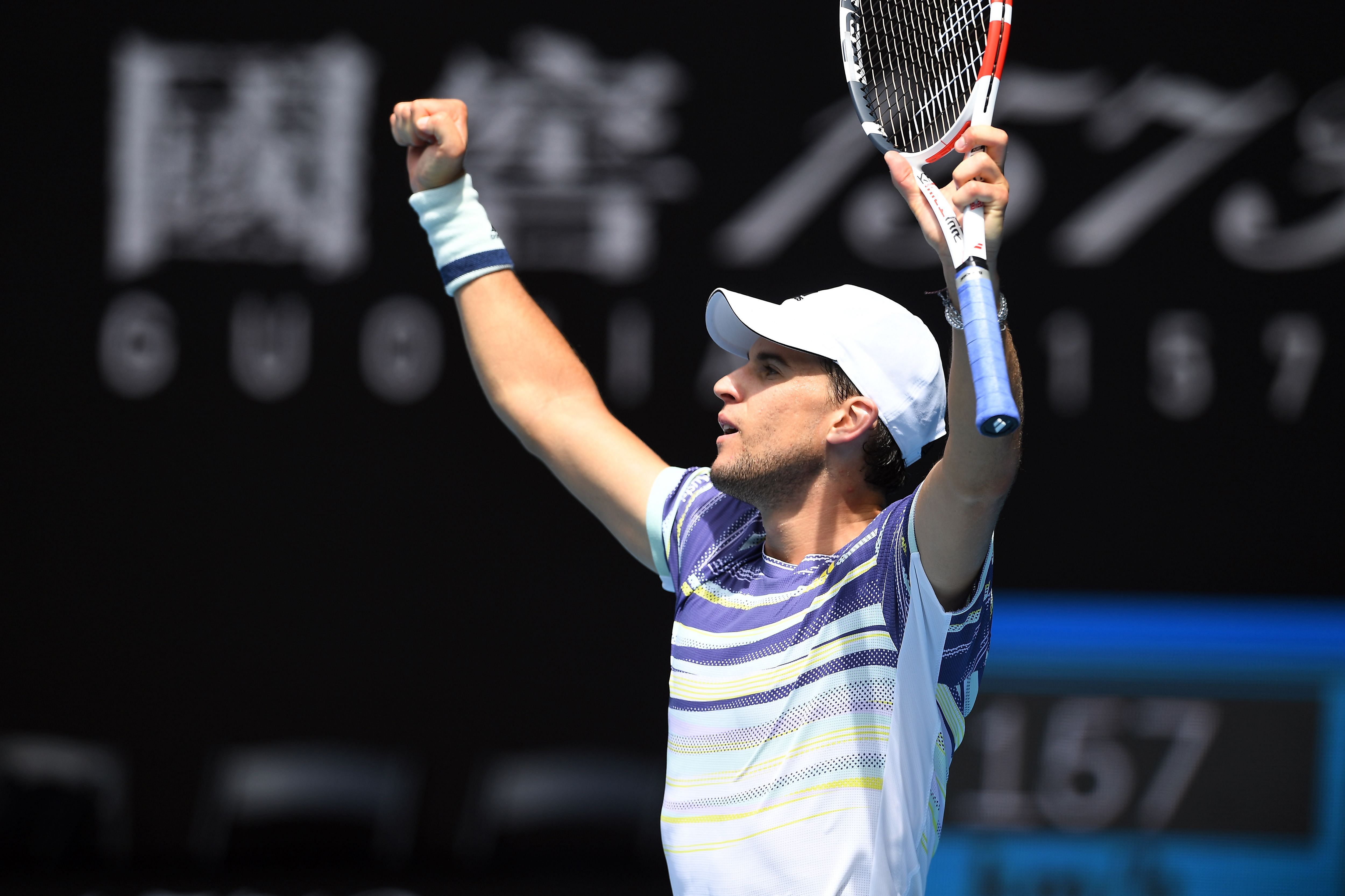 Austria's Dominic Thiem celebrates after victory France's Gael Monfils during their men's singles match on day eight of the Australian Open tennis tournament in Melbourne. (AFP Photo)