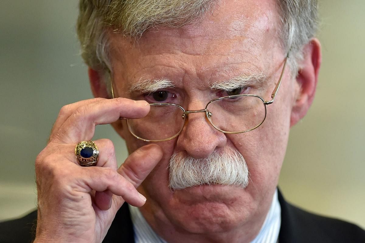 In this file photo taken on August 29, 2019 US National Security Advisor John Bolton answers journalists questions after his meeting with Belarus President in Minsk. (Credit AFP Photo)