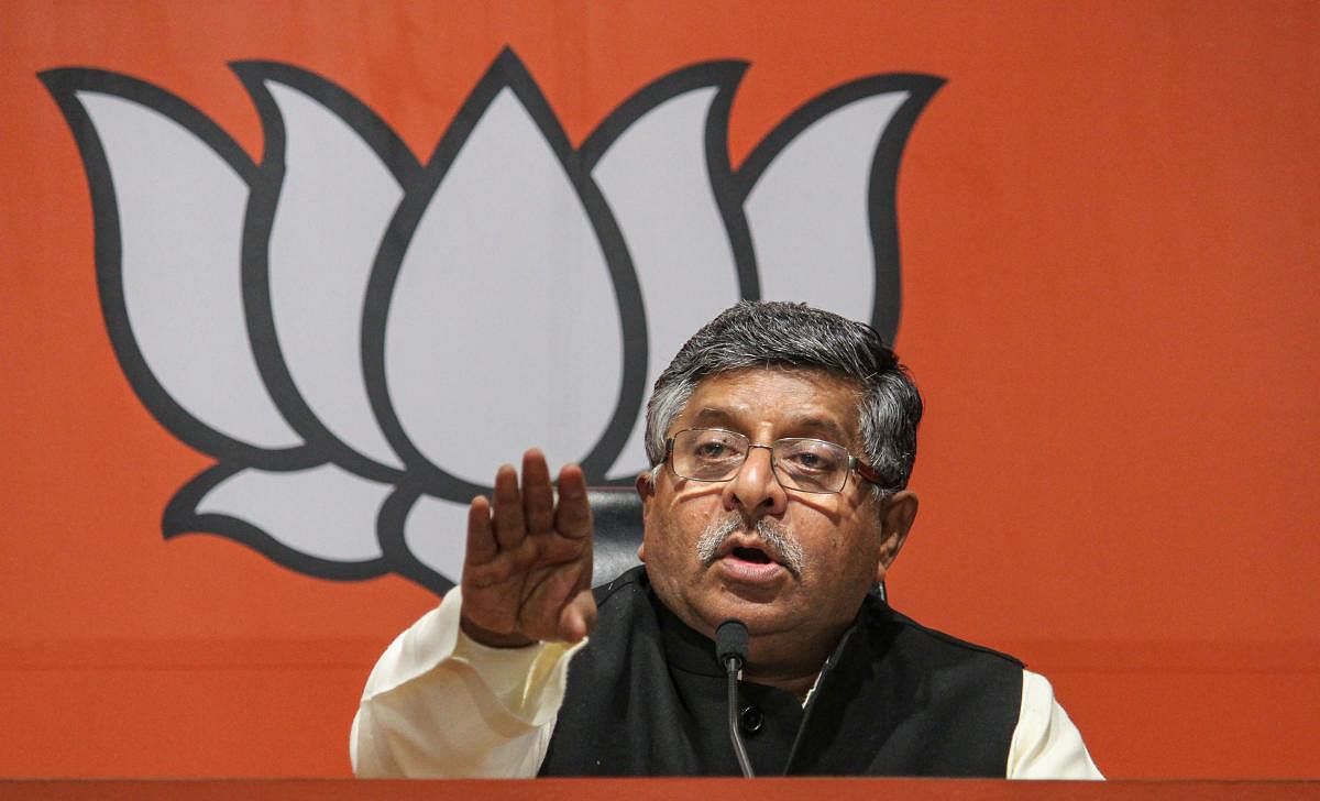 Union Minister Ravi Shankar Prasad claimed that those trying to fragment India are getting cover at Shaheen Bagh protest where the tricolours are being waived. Credit: PTI Photo