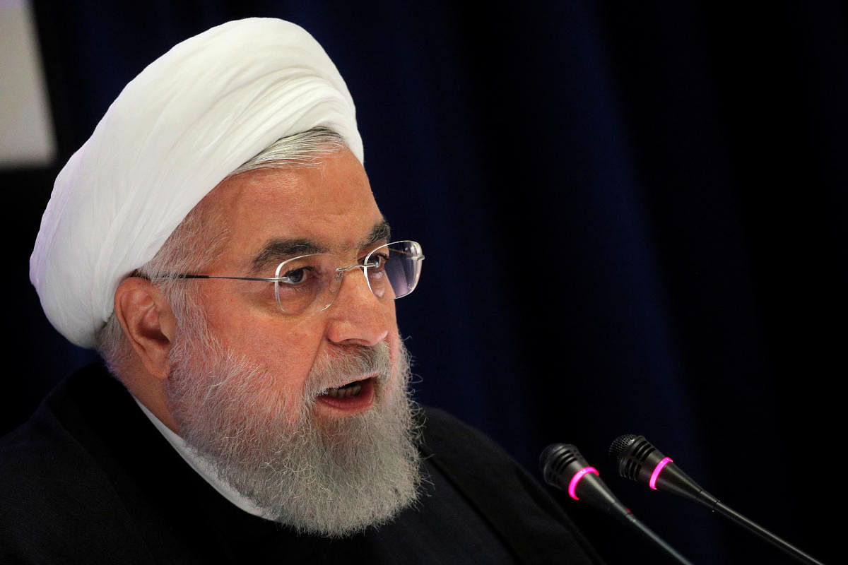 "We should remain united ... Don't turn your back on (Feb. 21) elections. Let's have a high turn out," Rouhani said. Credit: Reuters Photo