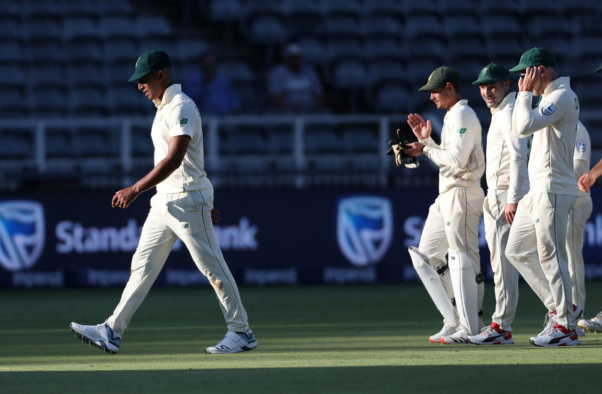 South Africa's Beuran Hendricks walks off the pitch at stumps after taking five wickets on his test debut. Credit: Reuters Photo