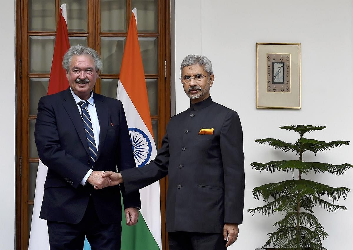 External Affairs Minister S Jaishankar (R) shakes hands with Minister of Foreign & European Affairs of the Grand Duchy of Luxembourg, Jean Asselborn. (PTI Photo)
