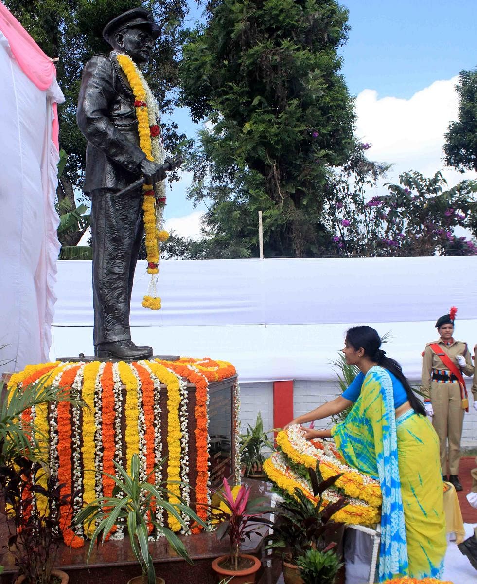 Deputy Commissioner Annies Kanmani Joy pays floral tributes to the statue of Field Marshal K M Cariappa in Madikeri on Tuesday.