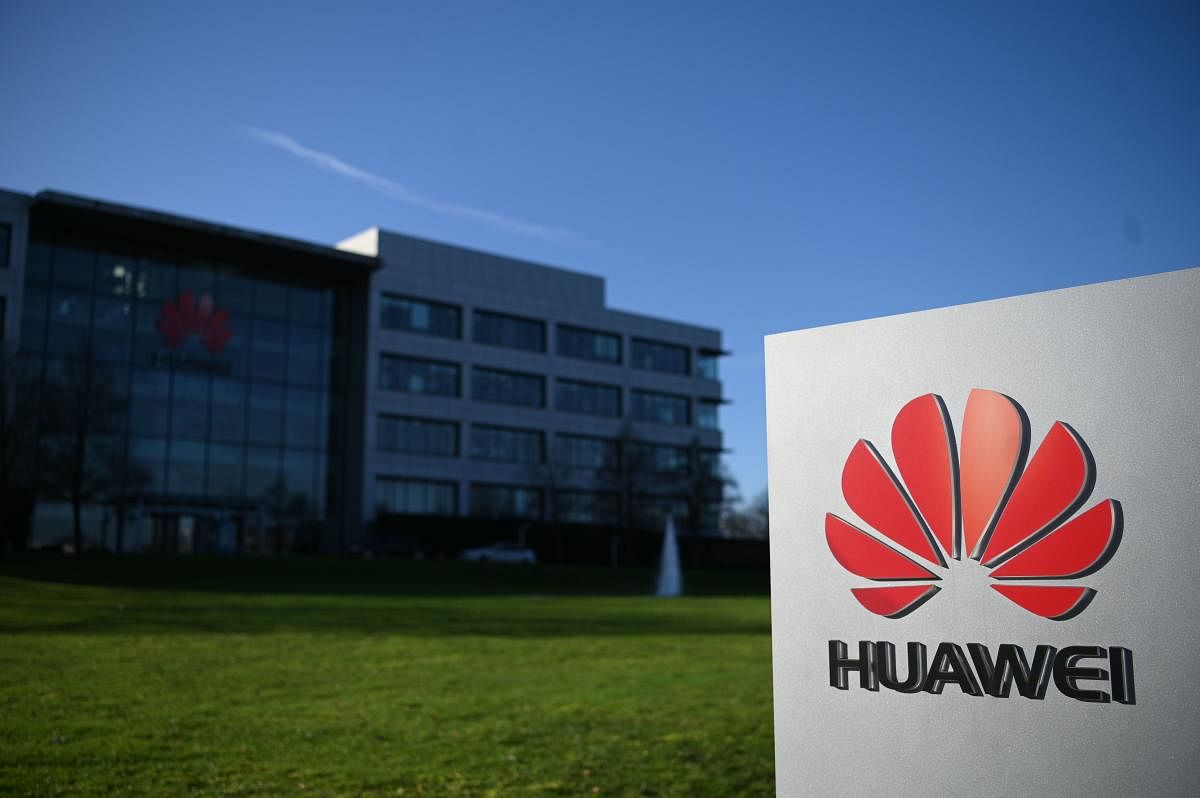 A photograph shows the logo of Chinese company Huawei at their main UK offices in Reading, west of London, on January 28, 2020. AFP